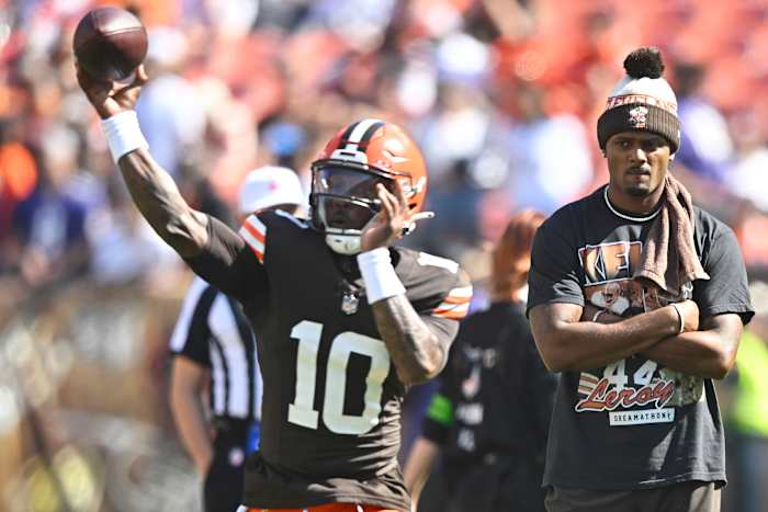 Oct 1, 2023; Cleveland, Ohio, USA; Cleveland Browns quarterback Deshaun Watson (right) watches quarterback PJ Walker (10) warm up before a game against the Baltimore Ravens at Cleveland Browns Stadium. Mandatory Credit: David Richard-USA TODAY Sports